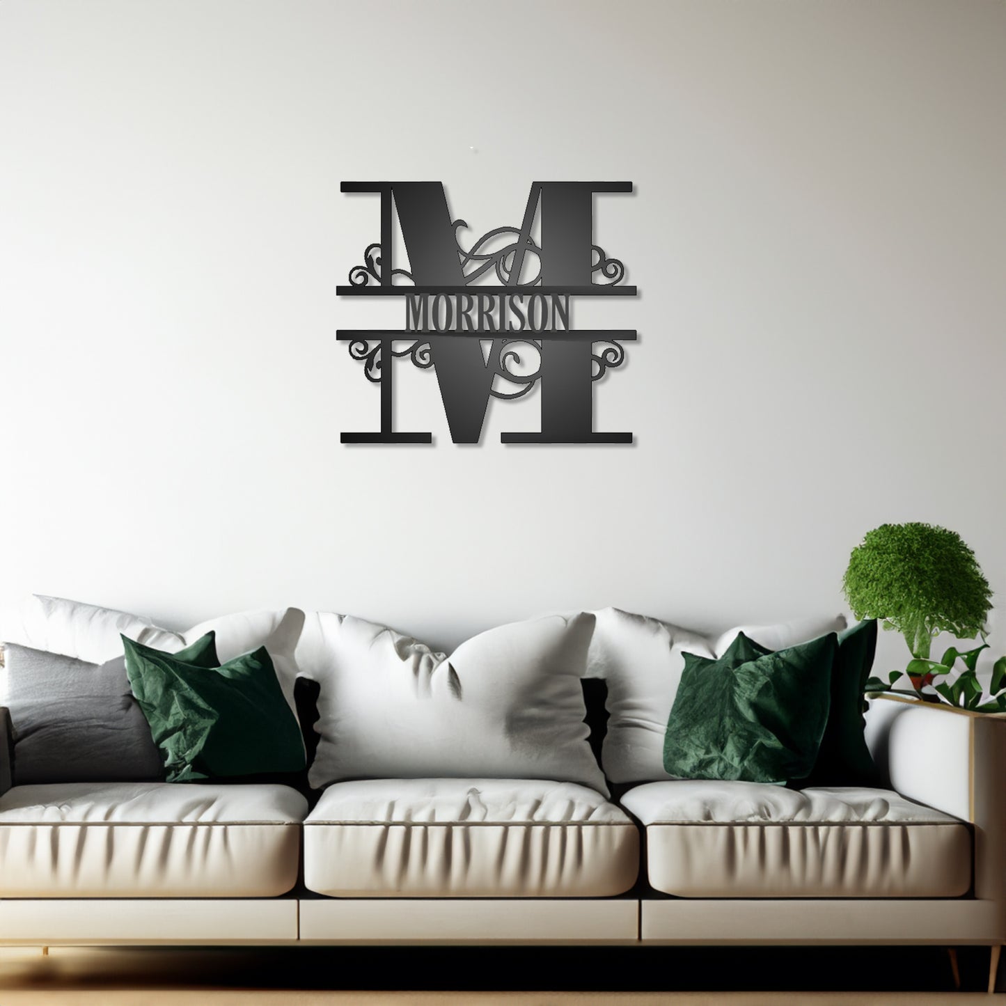 Scroll Monogram Family Name Sign M with "MORRISON" personalization shown on a wall in a family room