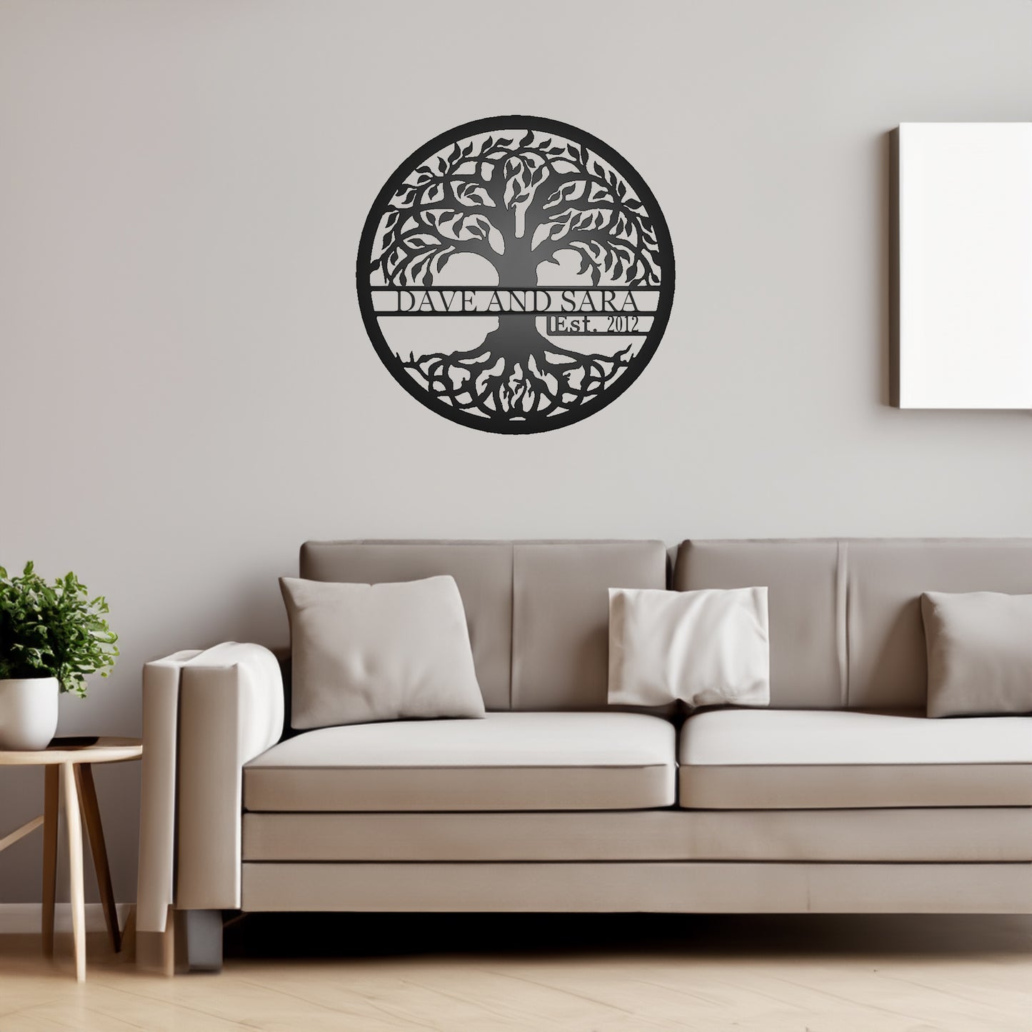 Tree of Life with Established Date Personalized Name Metal Sign with "Dave and Sara 2012" personalization shown on a wall in a family room