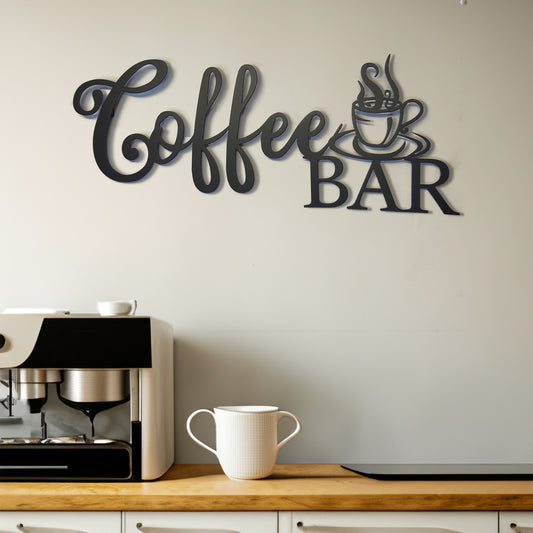 Coffee Bar Script Metal Sign shown on a wall in a modern kitchen