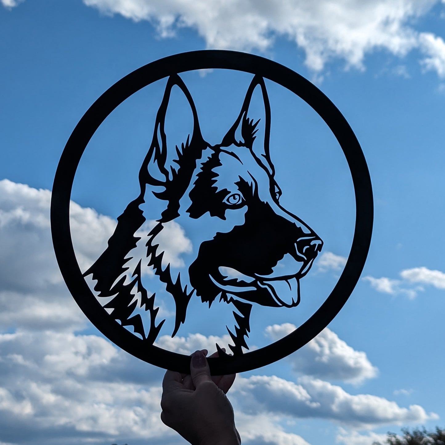 German Shepherd Dog Silhouette Metal Sign with blue sky and white cloud background