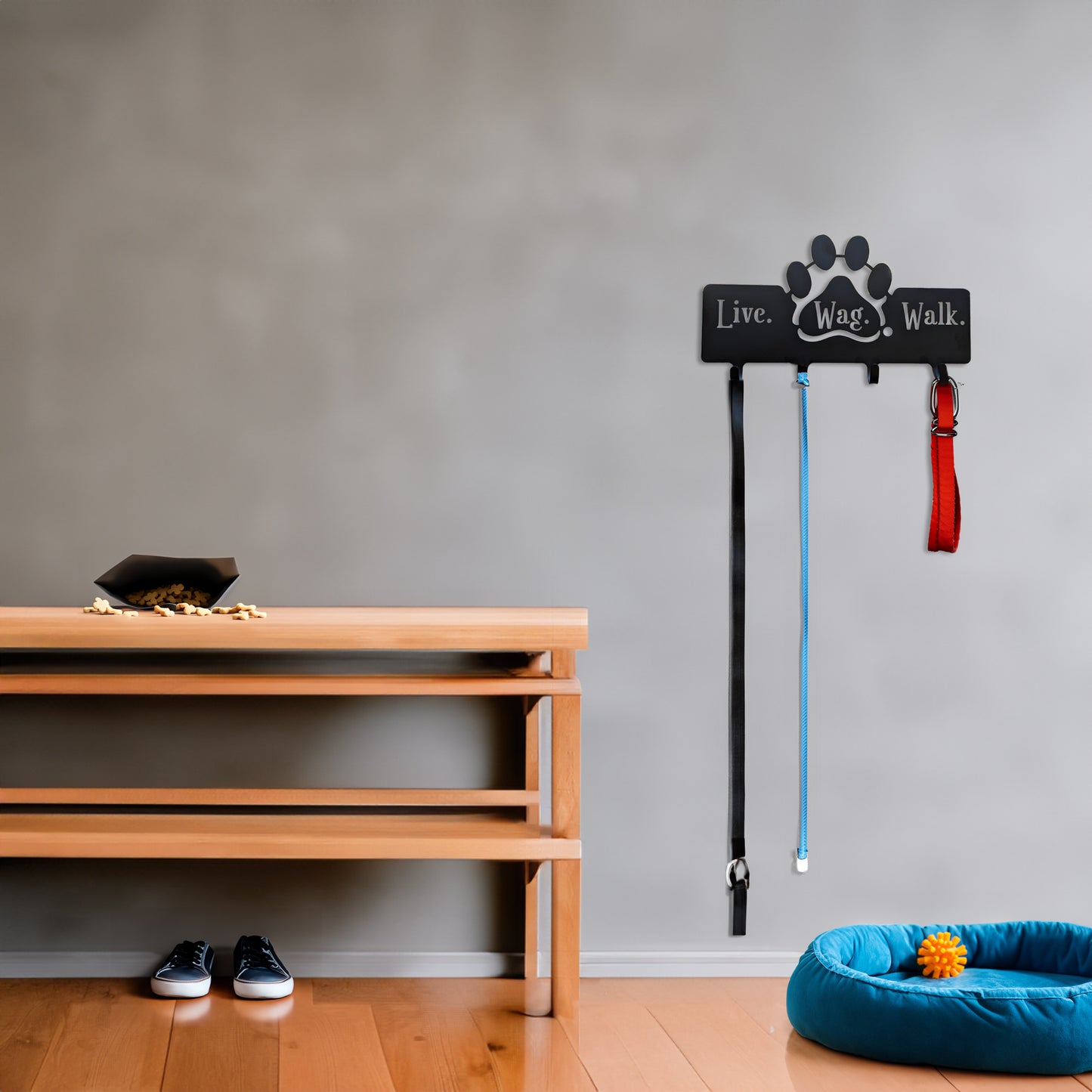 Metal Dog Leash Hanger Live, Wag, Walk shown mounted on a wall in a home foyer