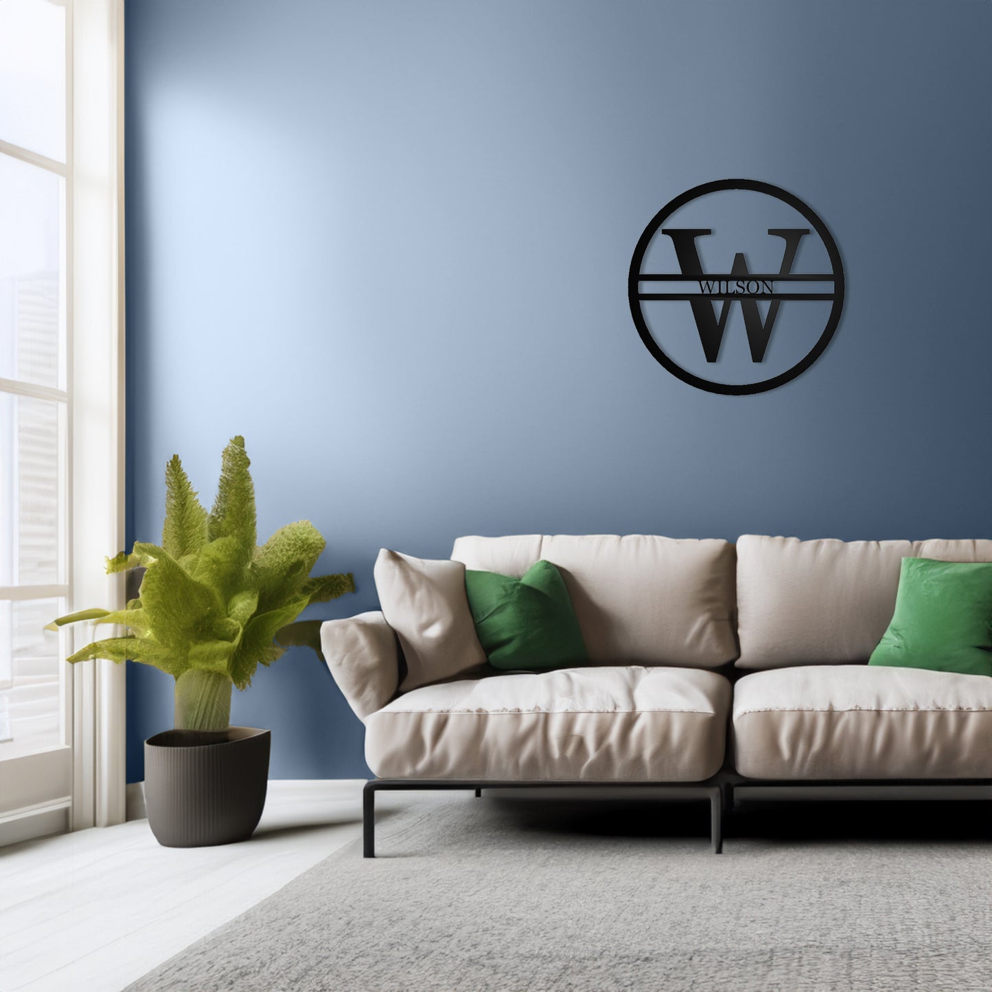 Modern Round Personalized Family Name & Initial Metal Sign with "WILSON" personalization shown on a wall in a living room
