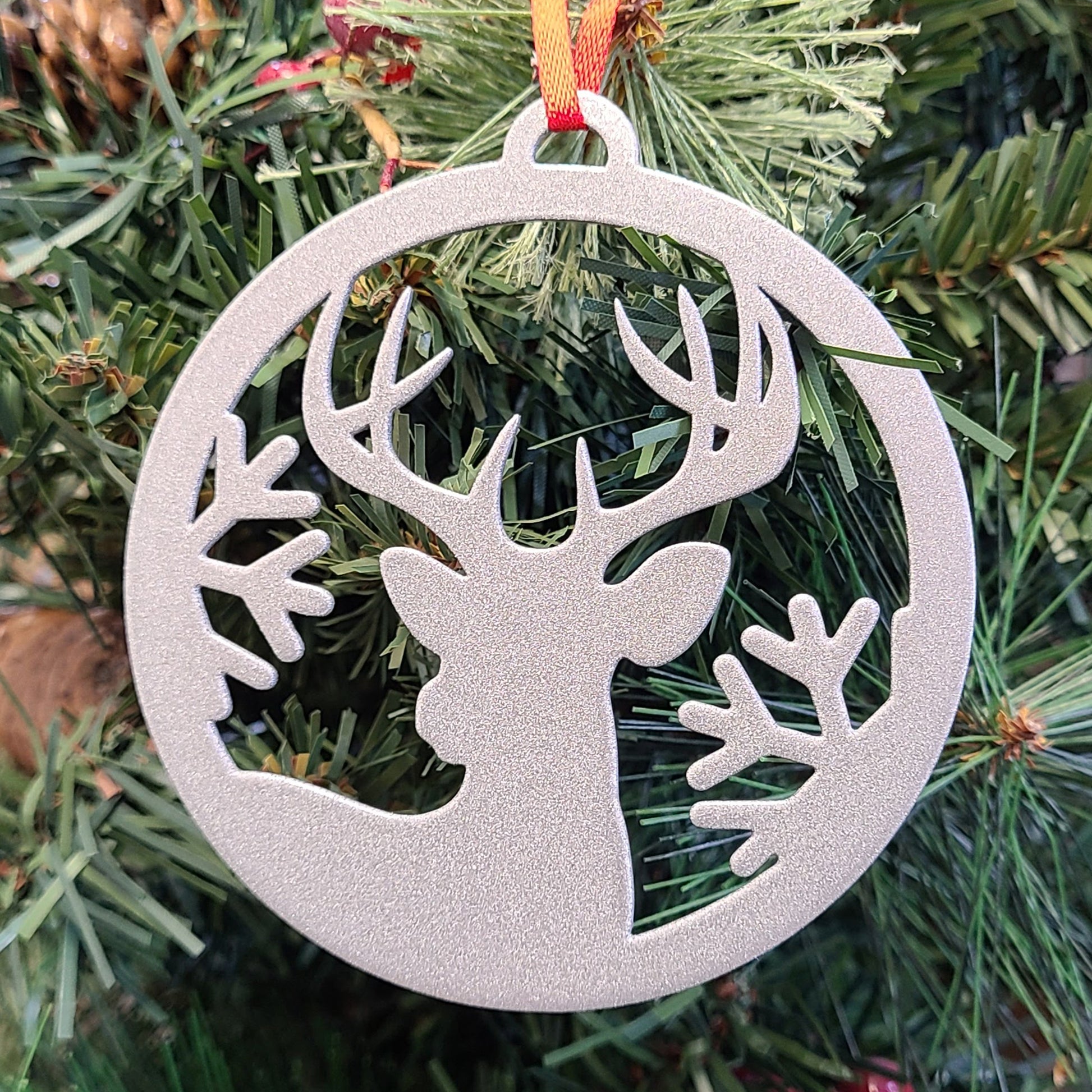Reindeer Snowflake Holiday Ornament Silver on Christmas tree
