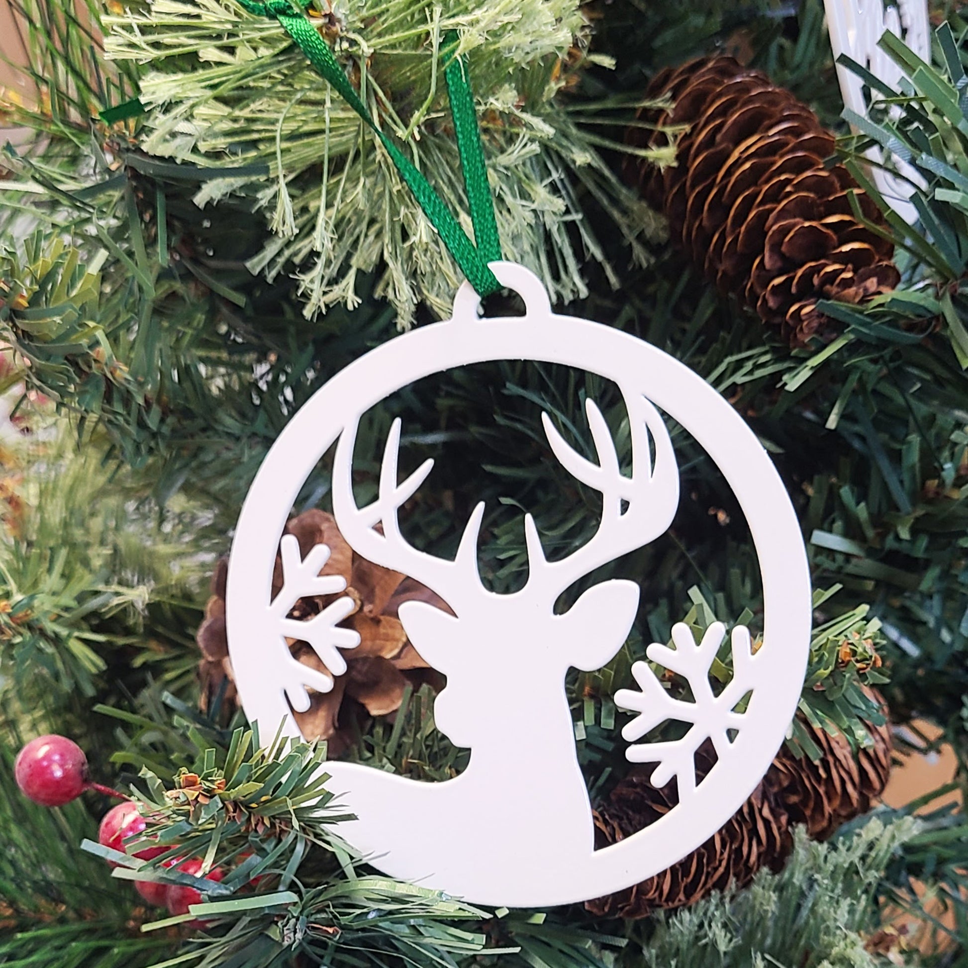 Reindeer Snowflake Holiday Ornament White on Christmas tree