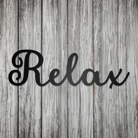 Relax Script Metal Sign on gray wood background