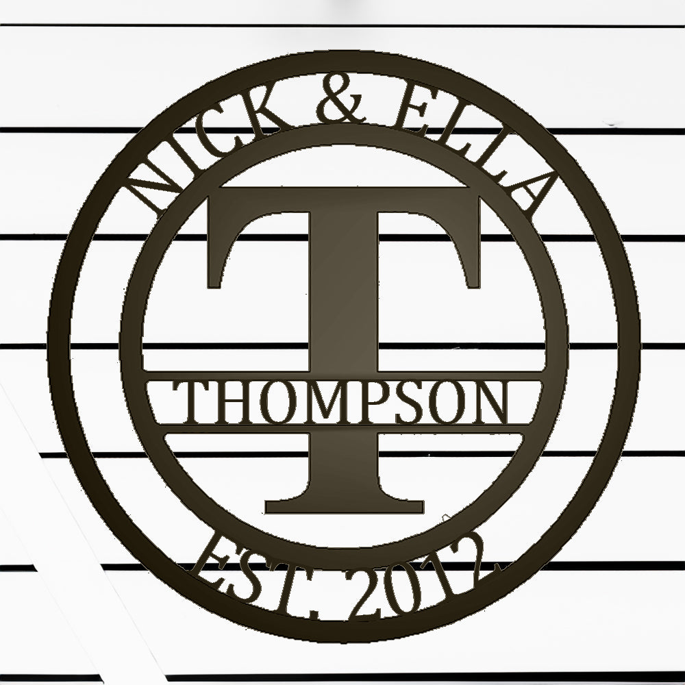 Round Monogram with Top Personalization and EST Date Bronze T with "THOMPSON" personalization on white batten background