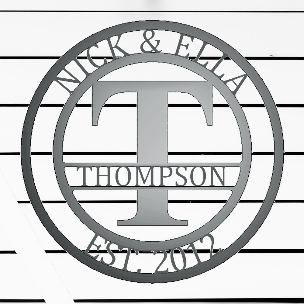 Round Monogram with Top Personalization and EST Date Silver T with "THOMPSON" personalization on white batten background