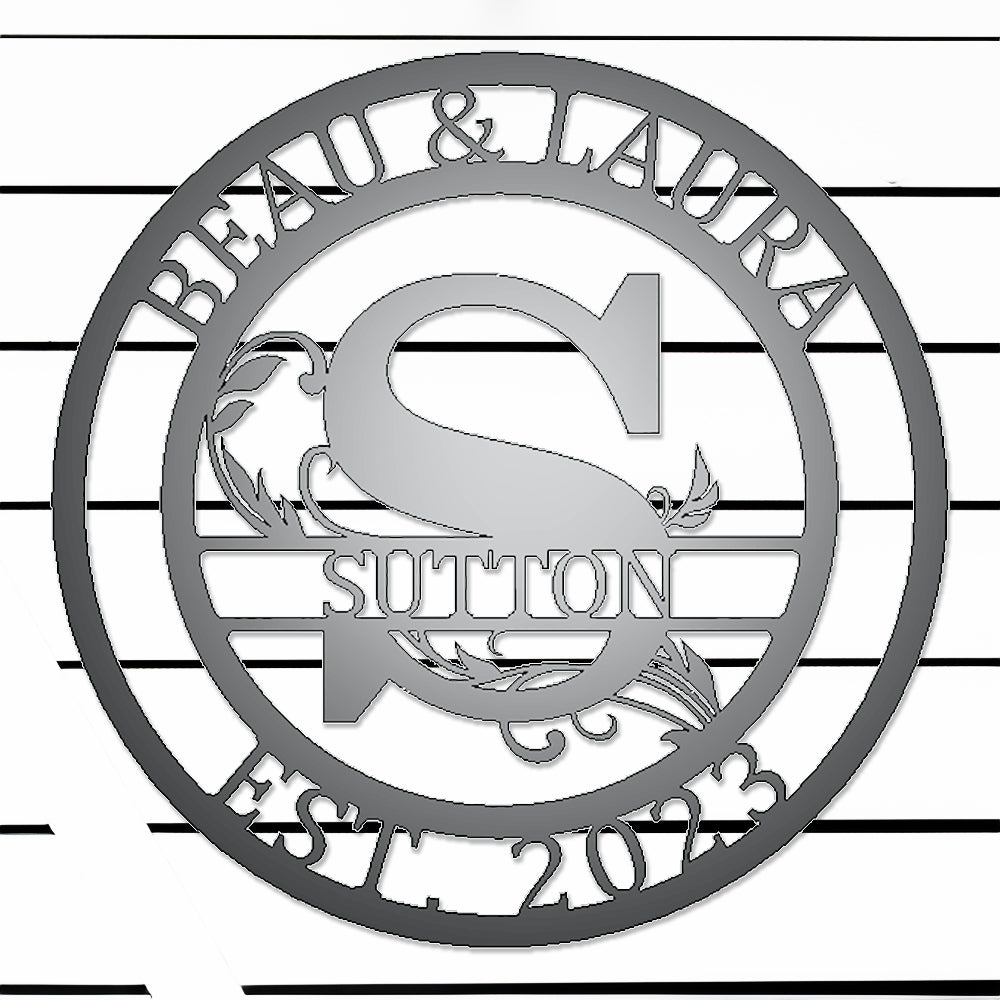 Round Scroll Monogram with Top Personalization and EST Date Silver S with "BEAU & LAURA SUTTON 2023" personalization on white batten background