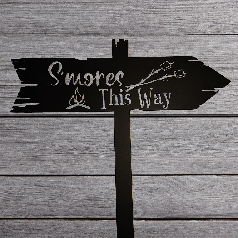 S'mores This Way Arrow Sign - Staked on gray wood background