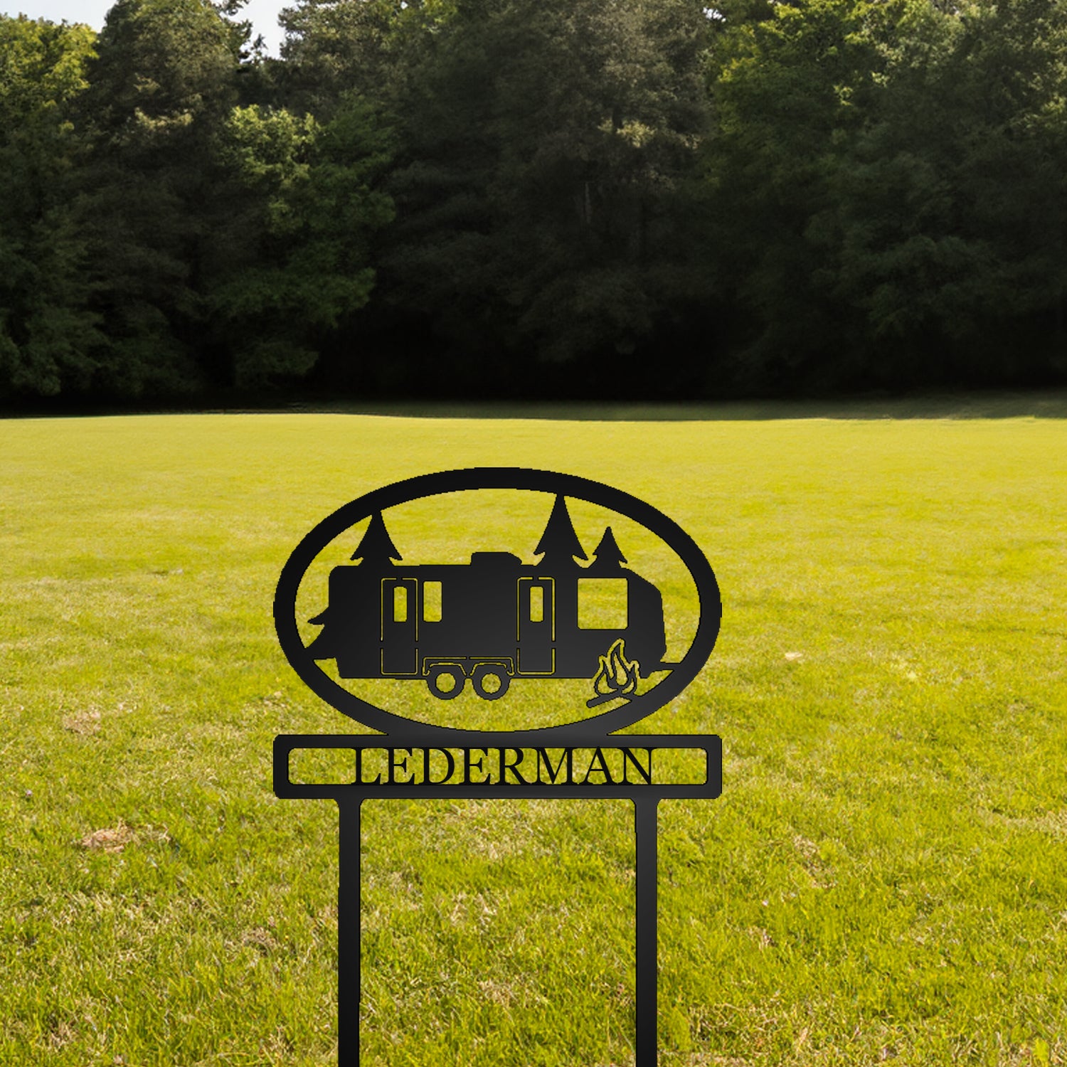 Travel Trailer with Personalized Name Metal Sign with "LEDERMAN" personalization in grassy field backround