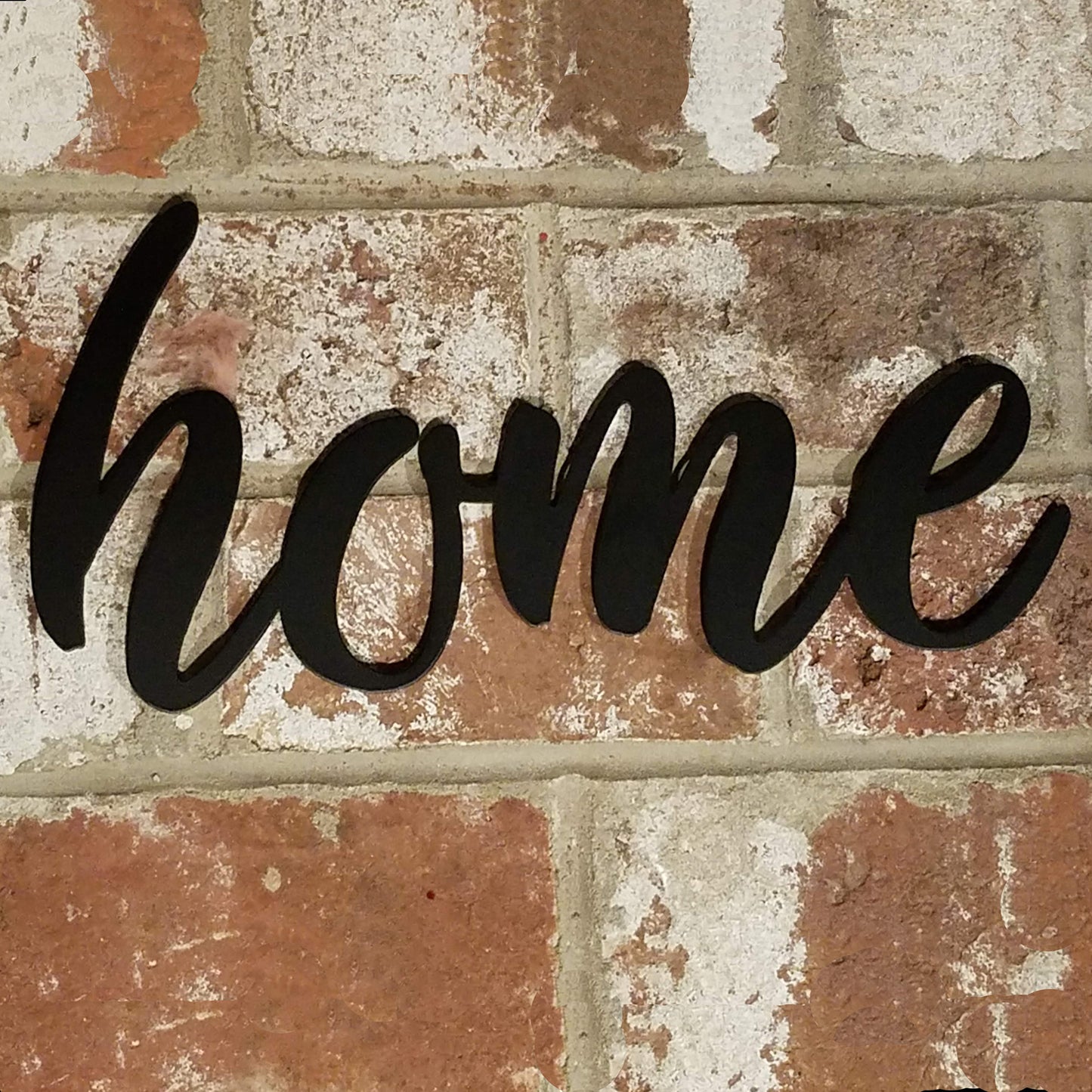 Home Script Metal Sign Black - on brick