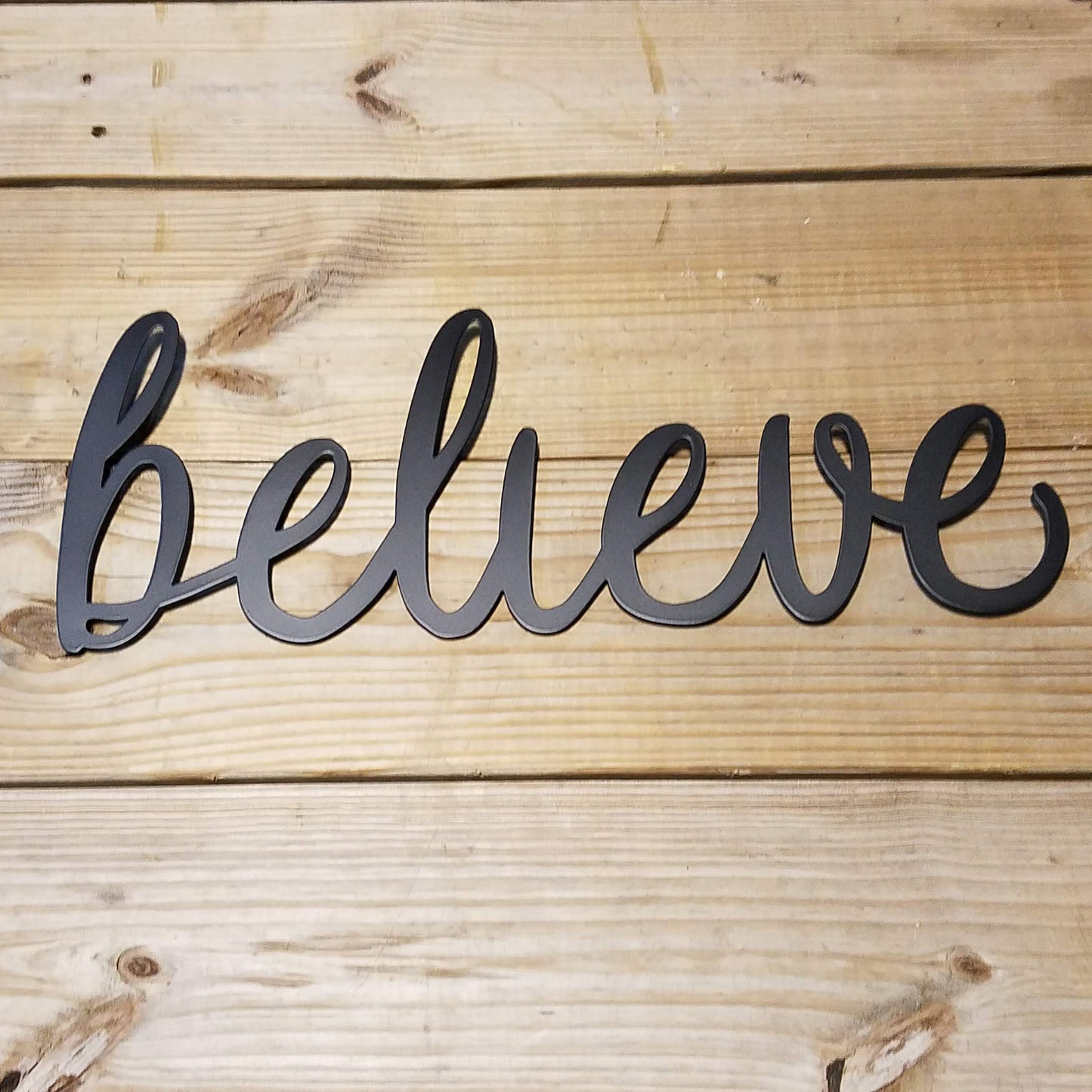 Believe Script Metal Sign Black - on wood slat