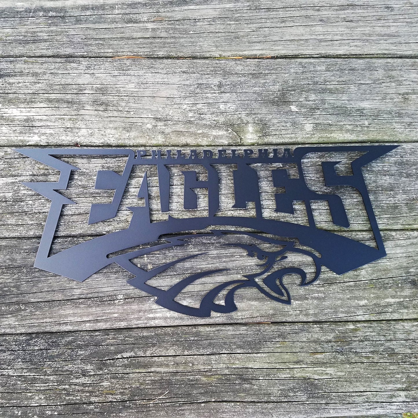 Eagles Logo Metal Sign Black - on wood