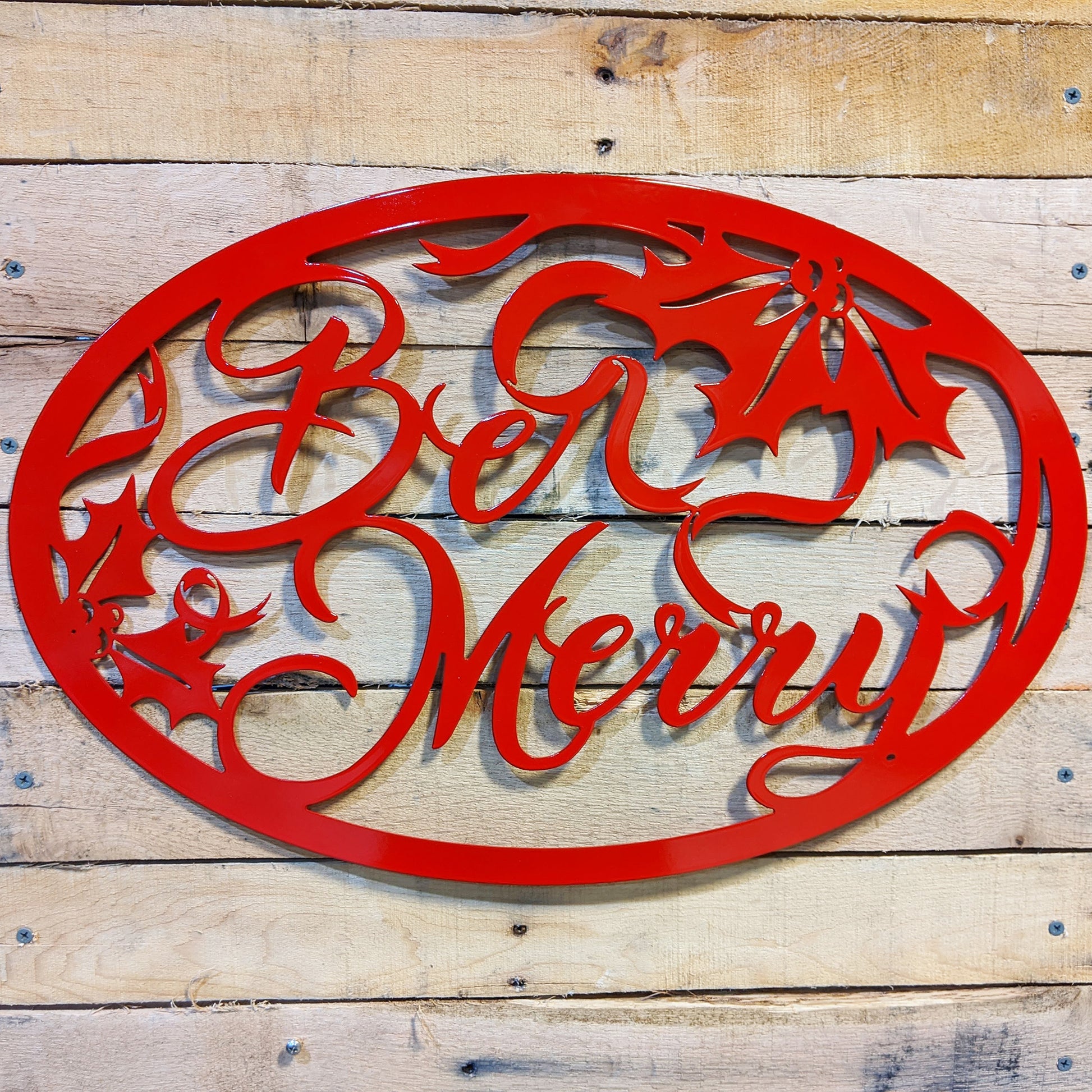 Be Merry Oval Holiday Metal Sign Red - on wood slat