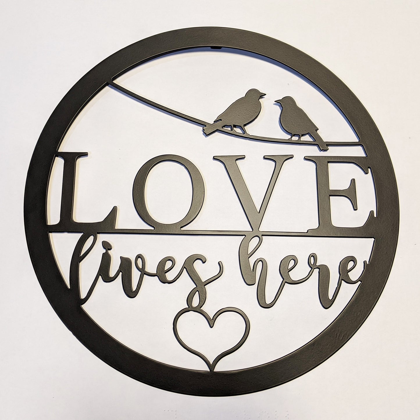 Love Lives Here Round Metal Sign Black