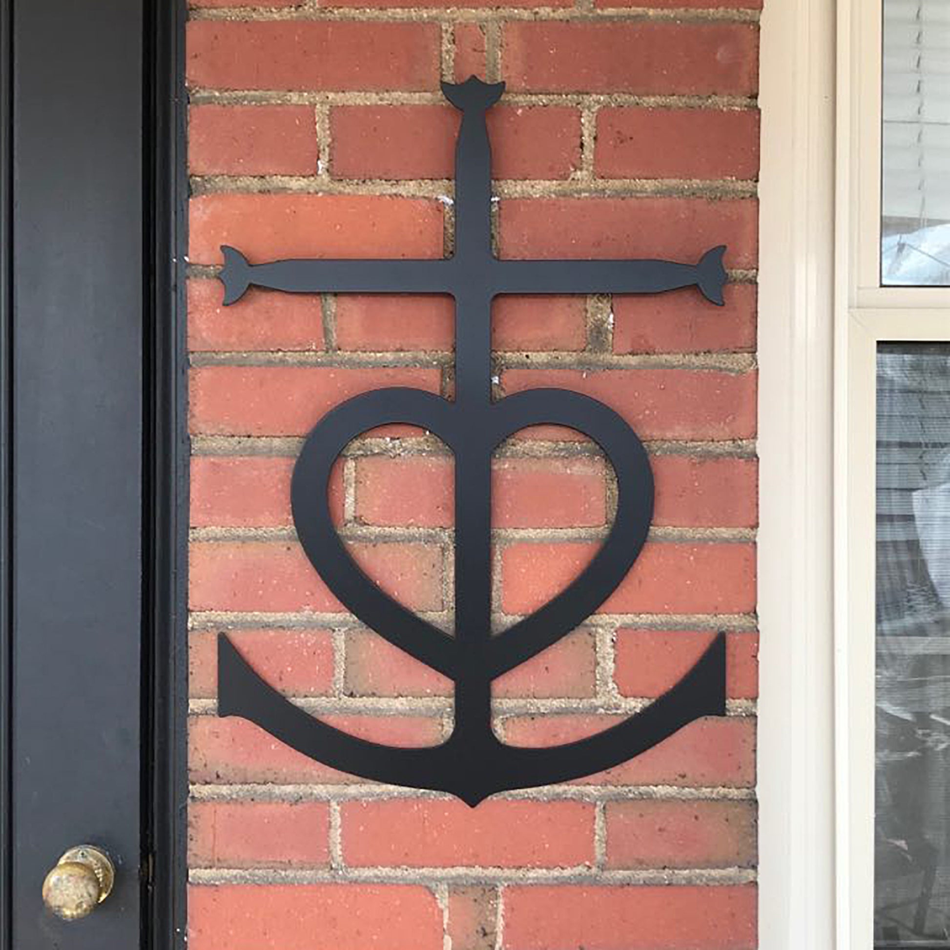 Faith, Hope, Love Metal Sign Black - on brick