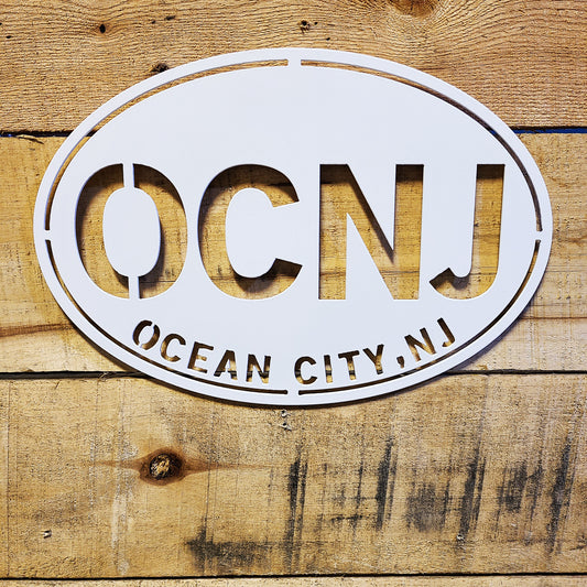 Ocean City New Jersey Oval Metal Wall Sign White on wood plank background