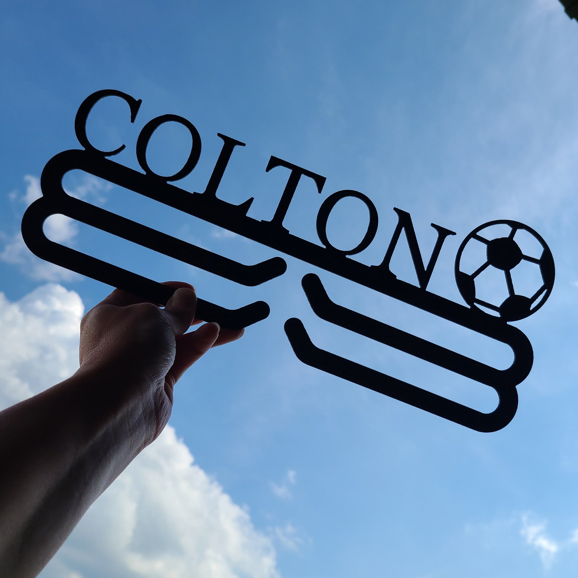 Personalized Soccer Medal Hanger Black with "COLTON" personalization