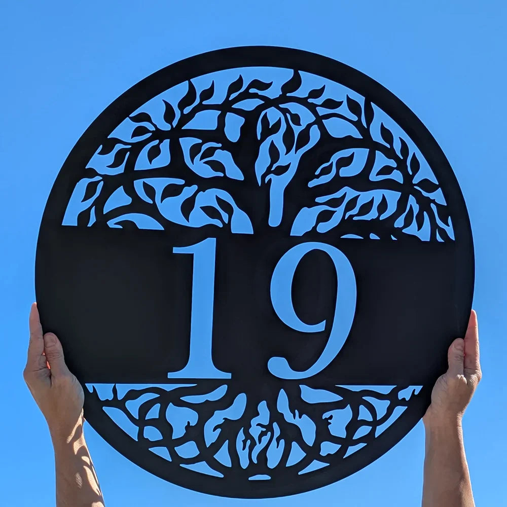 Tree of Life Address Sign with a 19 Personalization Black with blue sky background
