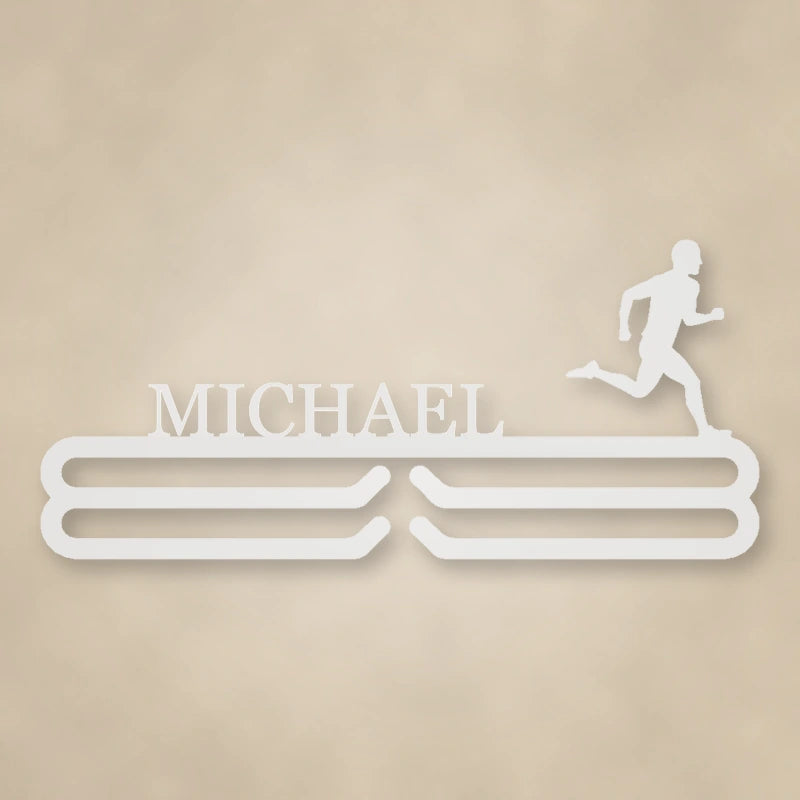 Personalized Male Runner Silhouette Medal Hanger shown in Gloss White powder coat finish.
