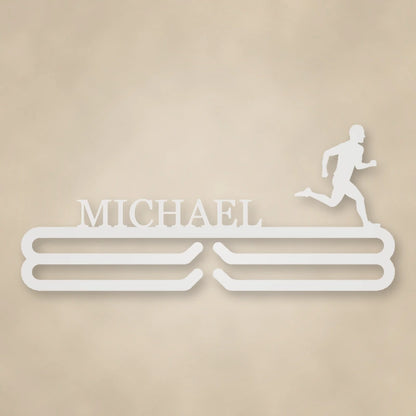 Personalized Male Runner Silhouette Medal Hanger shown in Gloss White powder coat finish.
