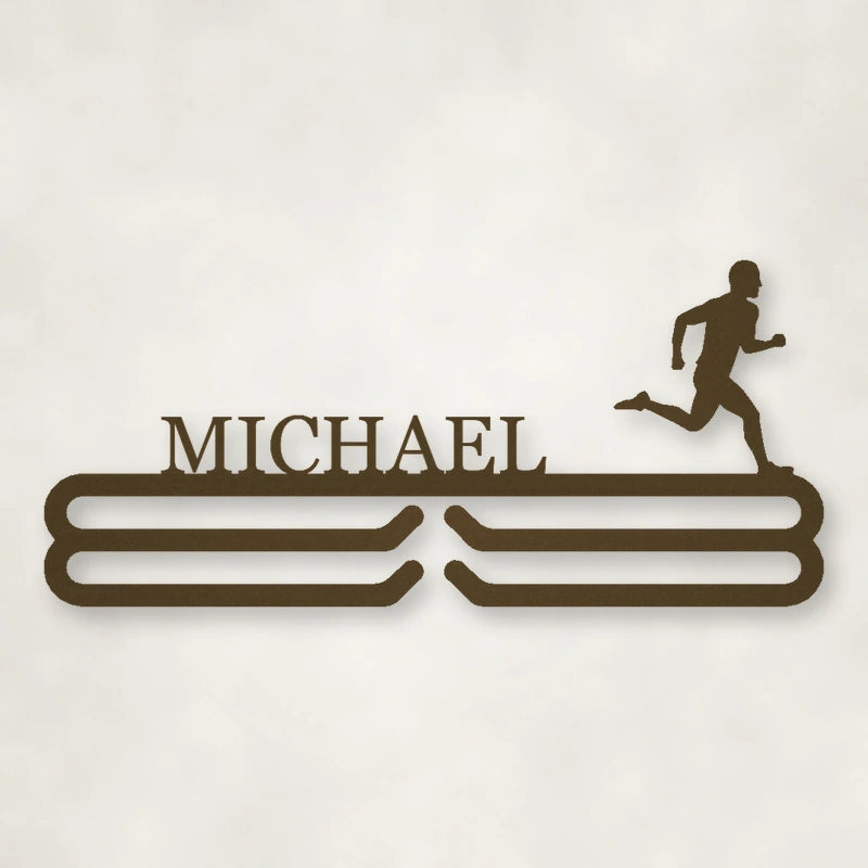 Personalized Male Runner Silhouette Medal Hanger shown in Metallic Bronze powder coat finish.