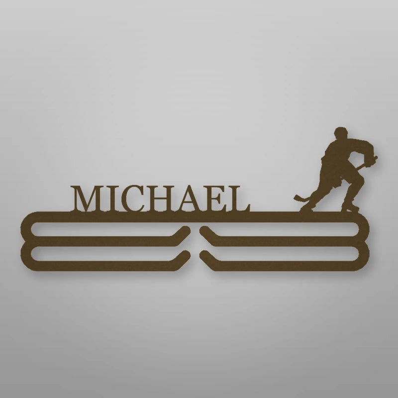 Personalized Ice Hockey Medal Hanger shown in Metallic Bronze powder coat finish.