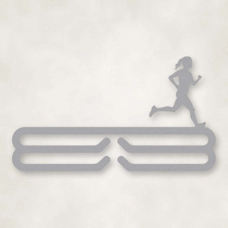 Female Runner Silhouette Medal Rack shown in Metallic Silver powder coat finish.