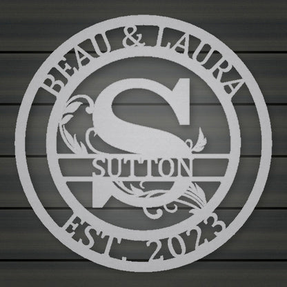 Round Scroll Monogram Metal Sign With Top Personalization And Est Date shown in Metallic Silver powder coat finish.