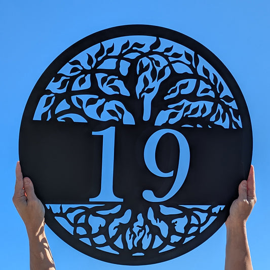 Tree of Life Metal Address Sign black with 19 personalization on blue sky background