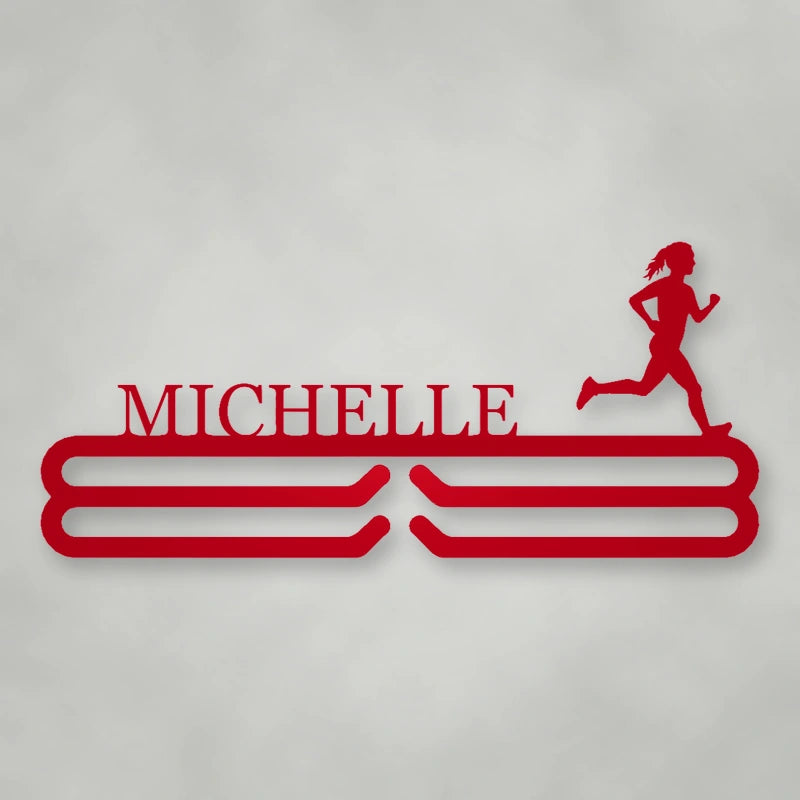 Personalized Female Runner Silhouette Medal Hanger shown in Gloss Red powder coat finish.