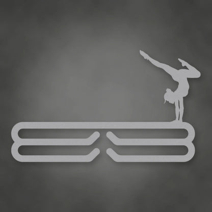 Female Gymnast Medal Hanger shown in Metallic Silver powder coat finish.
