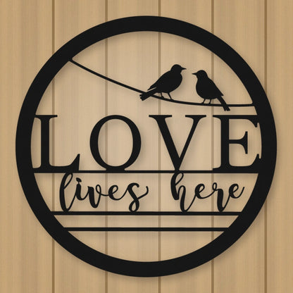 Love Lives Here Metal Sign shown in Matte Black powder coat finish.