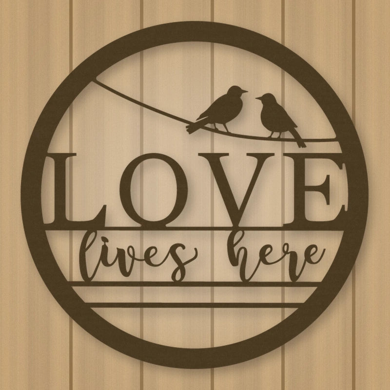Love Lives Here Metal Sign shown in Metallic Bronze powder coat finish.