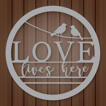Love Lives Here Metal Sign shown in Metallic Silver powder coat finish.