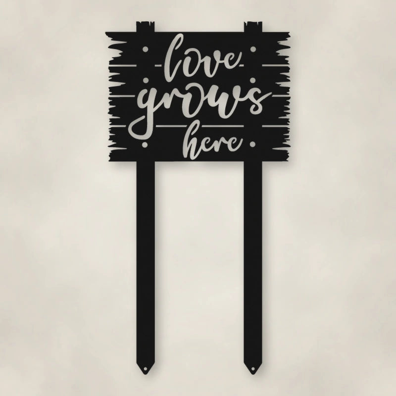 Love Grows Here Metal Sign With Stakes shown in Matte Black powder coat finish.