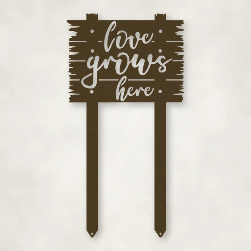 Love Grows Here Metal Sign With Stakes shown in Metallic Bronze powder coat finish.
