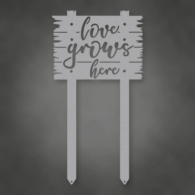 Love Grows Here Metal Sign With Stakes shown in Metallic Silver powder coat finish.