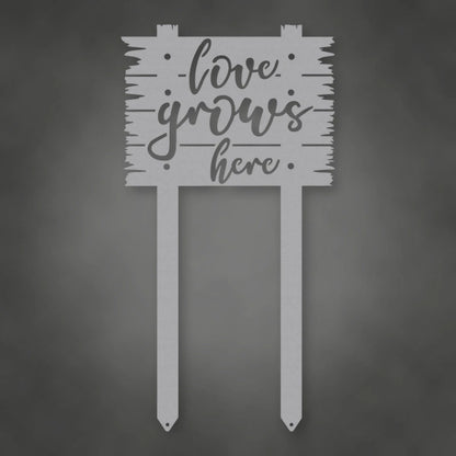 Love Grows Here Metal Sign With Stakes shown in Metallic Silver powder coat finish.