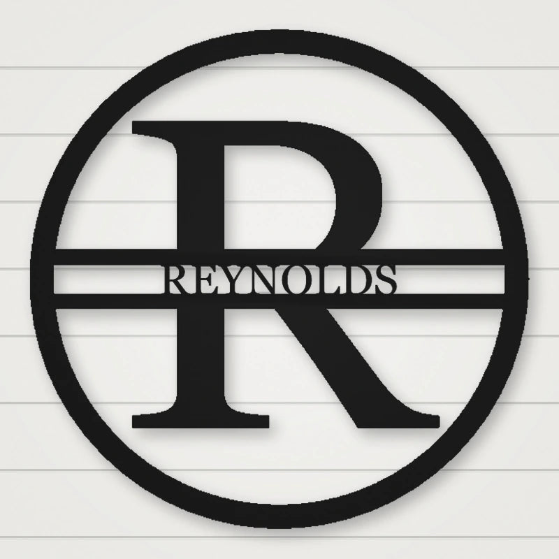 Modern Round Personalized Family Name & Initial Metal Sign shown in Matte Black powder coat finish.