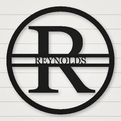 Modern Round Personalized Family Name & Initial Metal Sign shown in Matte Black powder coat finish.