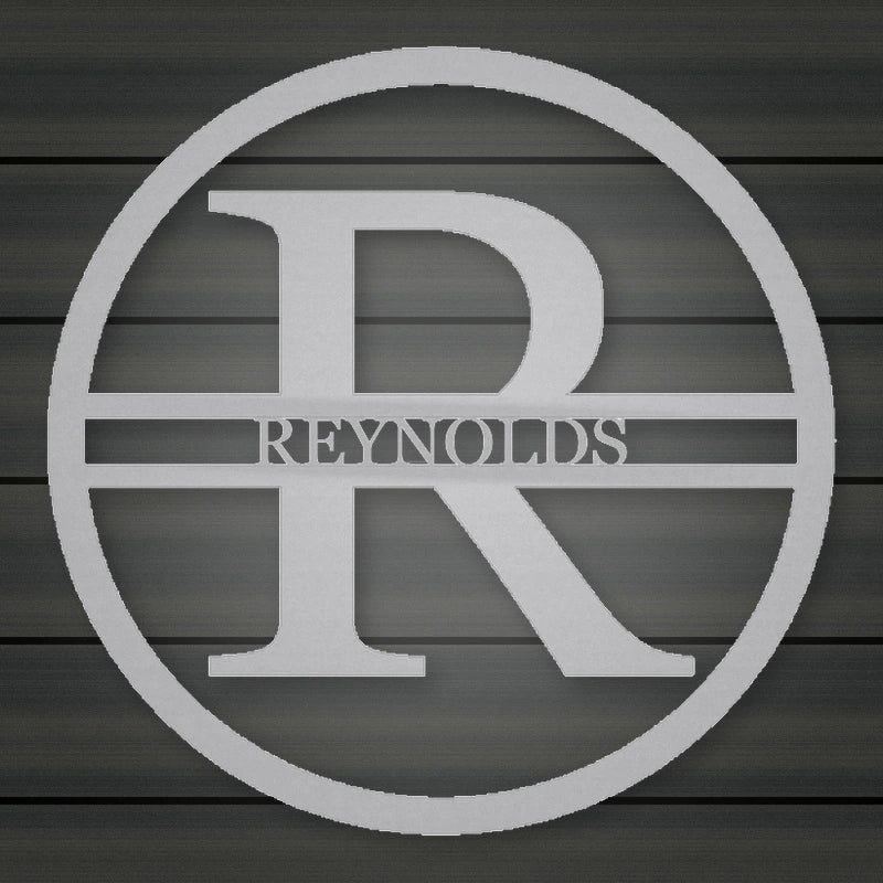 Modern Round Personalized Family Name & Initial Metal Sign shown in Metallic Silver powder coat finish.