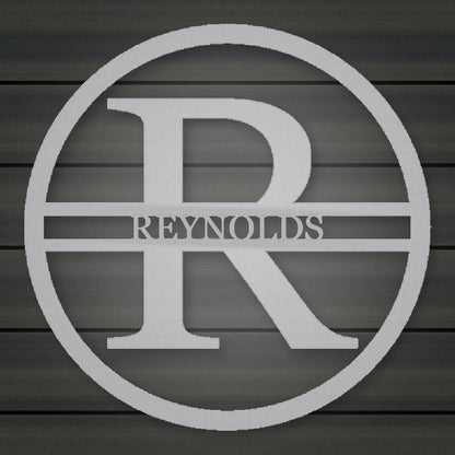 Modern Round Personalized Family Name & Initial Metal Sign shown in Metallic Silver powder coat finish.