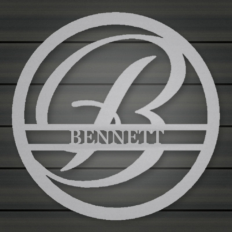 Round Personalized Family Name With Scroll Initial Metal Sign shown in Metallic Silver powder coat finish.