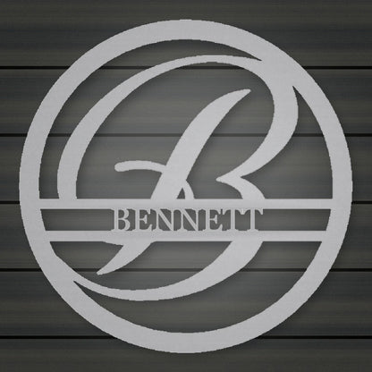 Round Personalized Family Name With Scroll Initial Metal Sign shown in Metallic Silver powder coat finish.